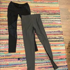Two pairs of medium workout leggings, small hole